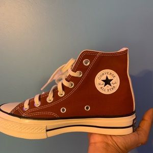 Never worn. Half brown half blue